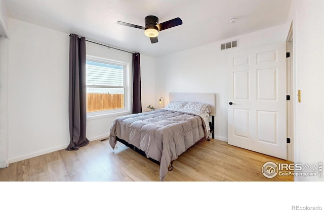 1403 Crestridge Dr, Loveland, CO 80537 - bedroom with light wood-type flooring and a ceiling fan
