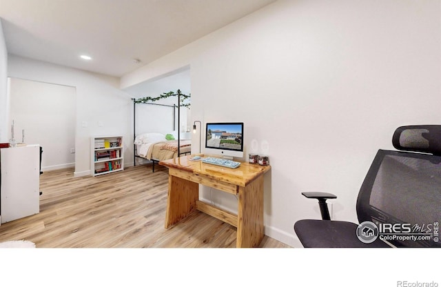 1403 Crestridge Dr, Loveland, CO 80537 - home office with light wood-type flooring and recessed lighting