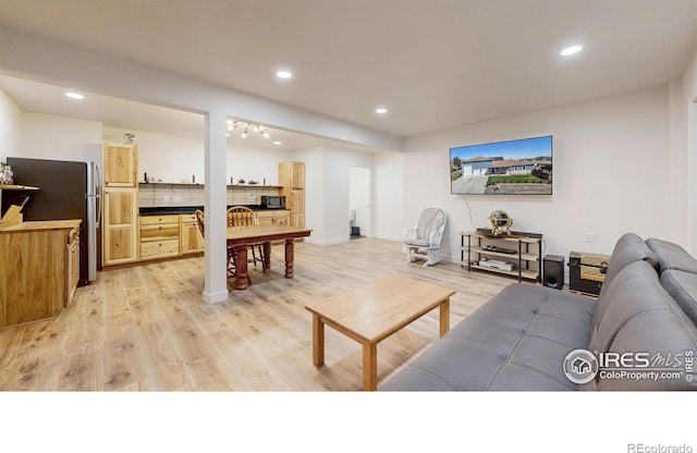 1403 Crestridge Dr, Loveland, CO 80537 - living area with light wood-style flooring and recessed lighting