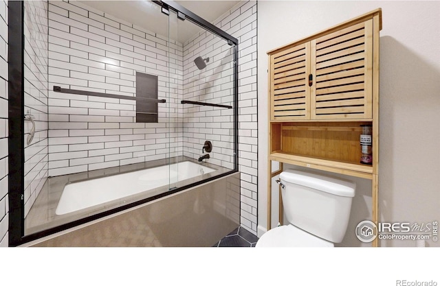 1403 Crestridge Dr, Loveland, CO 80537 - full bathroom with toilet and bath / shower combo with glass door