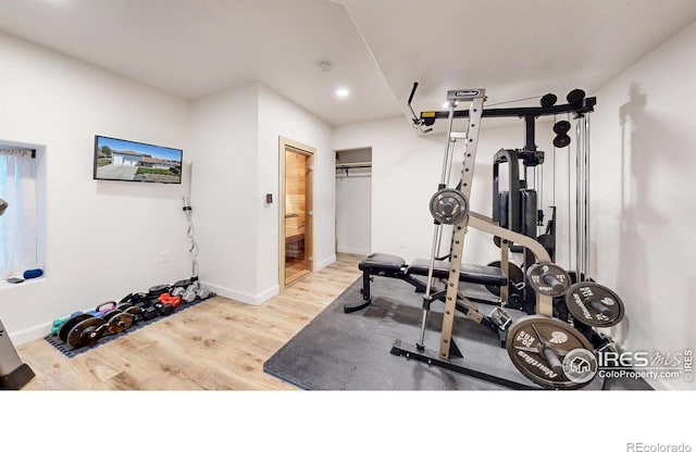 1403 Crestridge Dr, Loveland, CO 80537 - exercise room featuring wood finished floors and recessed lighting