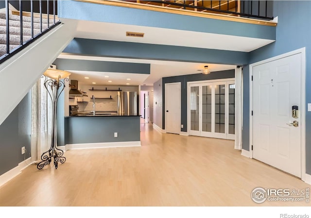 5918 Gunbarrel Ave Unit B, Boulder, CO 80301 - foyer with wood finished floors, stairway, and recessed lighting
