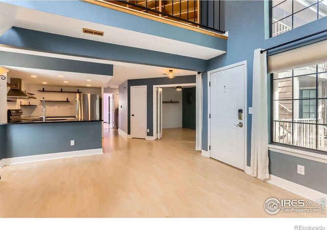 5918 Gunbarrel Ave Unit B, Boulder, CO 80301 - foyer with light wood-style floors and baseboards