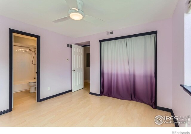 5918 Gunbarrel Ave Unit B, Boulder, CO 80301 - unfurnished bedroom with light wood finished floors and ceiling fan
