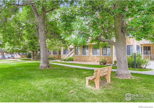 5918 Gunbarrel Ave Unit B, Boulder, CO 80301 - view of property hidden behind natural elements with a front lawn