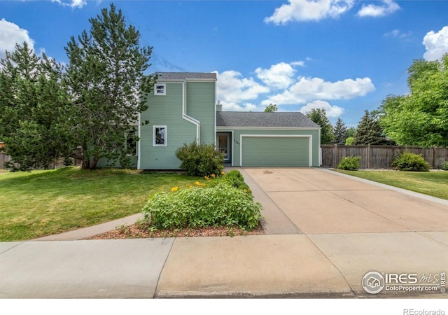 2707 W Stuart St, Fort Collins, CO 80526 - view of front facade with an attached garage and concrete driveway