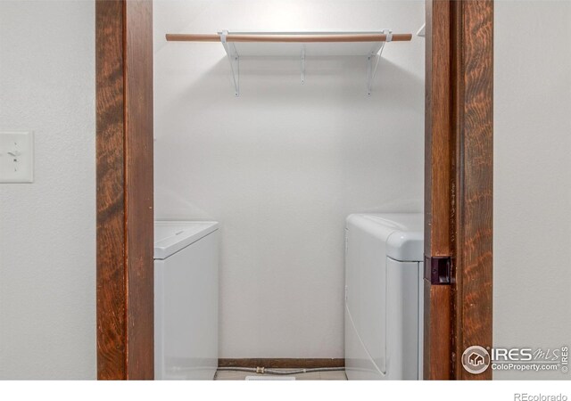2707 W Stuart St, Fort Collins, CO 80526 - washroom with washer and clothes dryer
