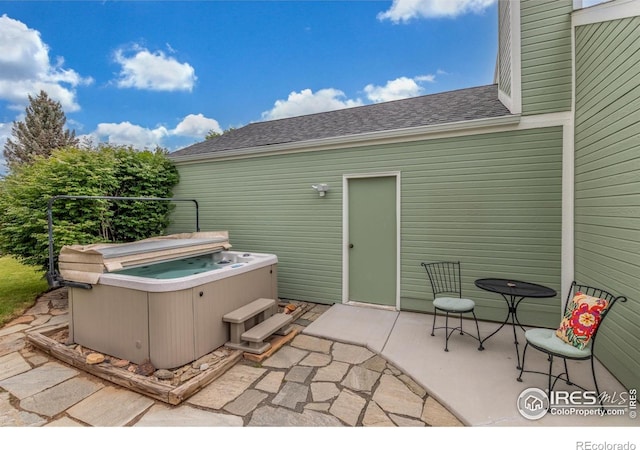 2707 W Stuart St, Fort Collins, CO 80526 - view of patio / terrace with a hot tub