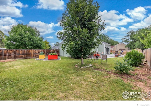 2707 W Stuart St, Fort Collins, CO 80526 - fenced backyard featuring a patio area