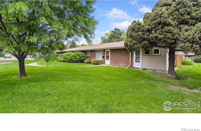 416 E Thunderbird Dr, Fort Collins, CO 80525 - single story home featuring a front lawn and brick siding