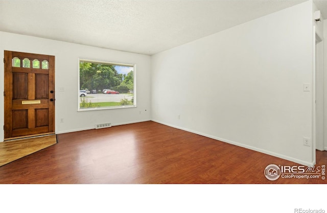 416 E Thunderbird Dr, Fort Collins, CO 80525 - foyer featuring wood finished floors