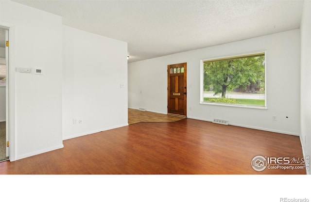 416 E Thunderbird Dr, Fort Collins, CO 80525 - empty room with wood finished floors and baseboards