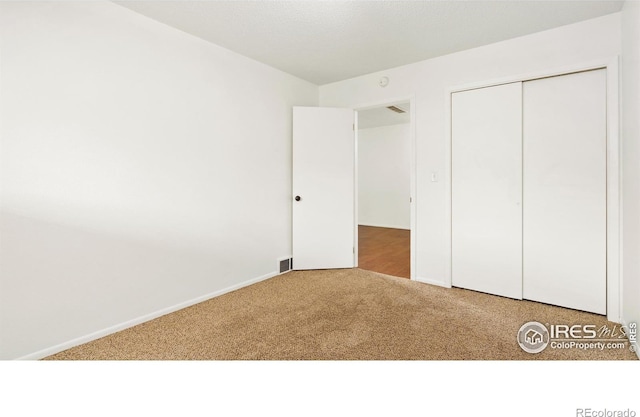 416 E Thunderbird Dr, Fort Collins, CO 80525 - unfurnished bedroom with carpet and a closet