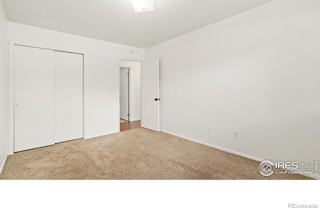 416 E Thunderbird Dr, Fort Collins, CO 80525 - unfurnished bedroom featuring carpet and a closet