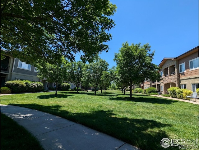 1122 Olympia Ave Unit 12H, Longmont, CO 80504 - view of home's community featuring a yard