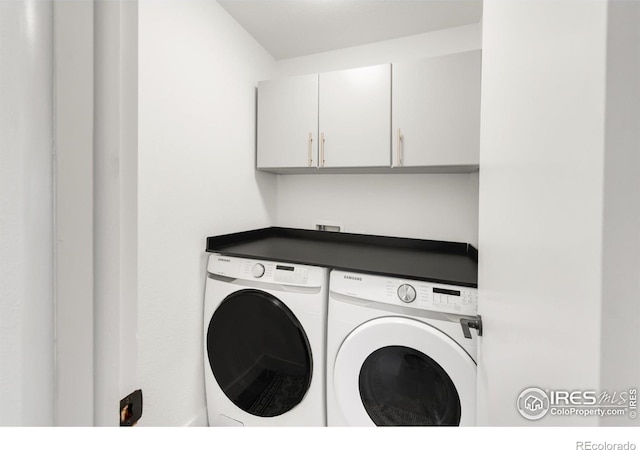 2025 Grape Ave, Boulder, CO 80304 - laundry room featuring washing machine and dryer and cabinet space