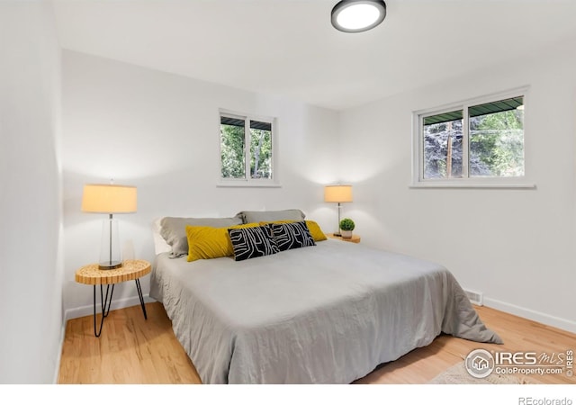 2025 Grape Ave, Boulder, CO 80304 - bedroom with wood finished floors and baseboards