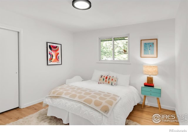 2025 Grape Ave, Boulder, CO 80304 - bedroom featuring wood finished floors and a closet