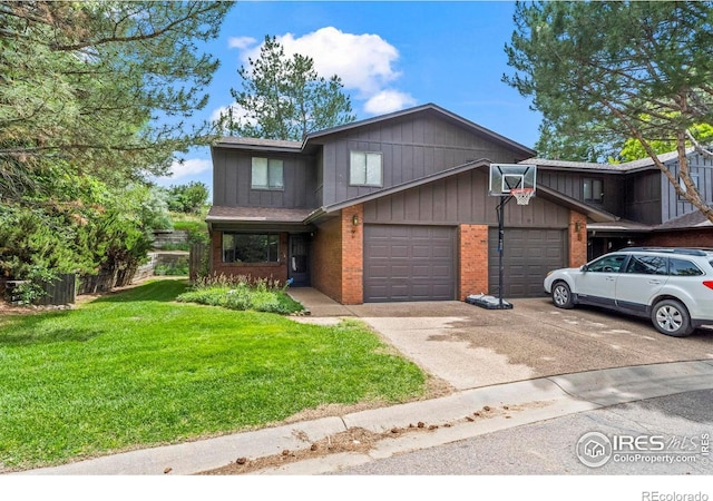 2840 W 21st St Unit 7, Greeley, CO 80634 - view of front facade featuring brick siding, a front yard, concrete driveway, and an attached garage