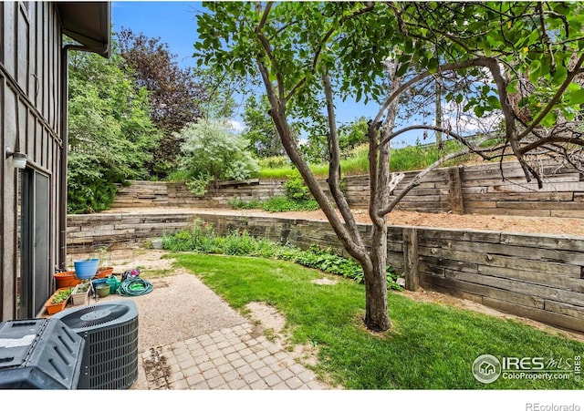 2840 W 21st St Unit 7, Greeley, CO 80634 - fenced backyard with a patio area