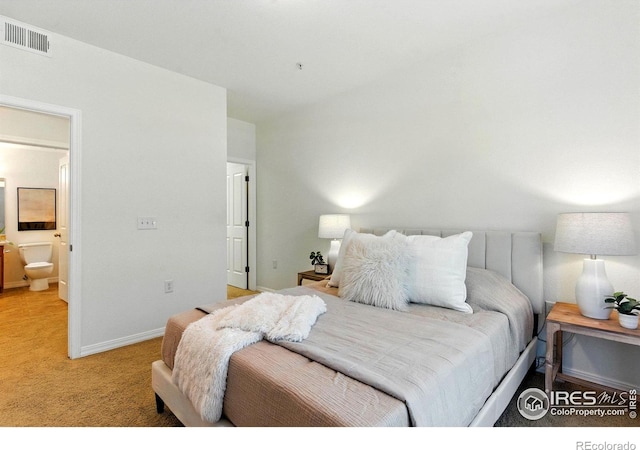 2450 Windrow Dr Unit E106, Fort Collins, CO 80525 - bedroom featuring light colored carpet and ensuite bath
