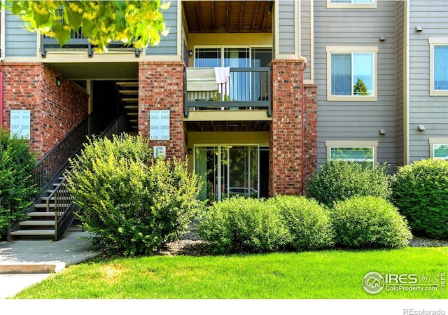 2450 Windrow Dr Unit E106, Fort Collins, CO 80525 - view of property with stairs