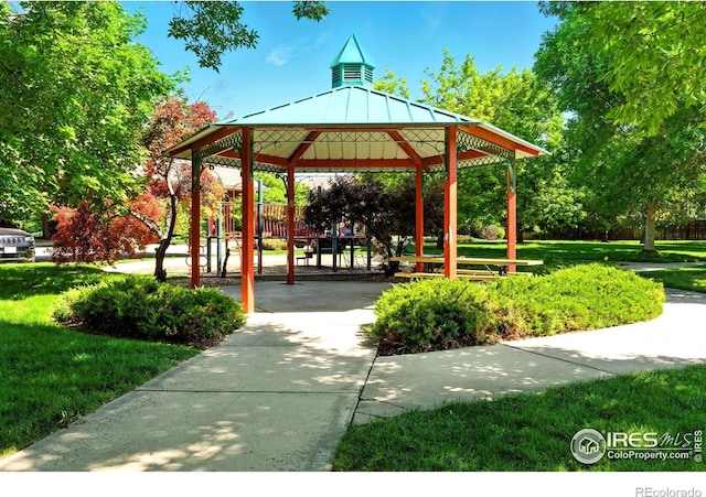2450 Windrow Dr Unit E106, Fort Collins, CO 80525 - surrounding community with a gazebo and a yard