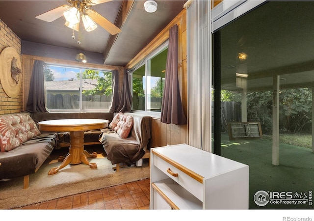 1323 Horizon Ln, Longmont, CO 80501 - living area featuring brick patterned flooring and a ceiling fan