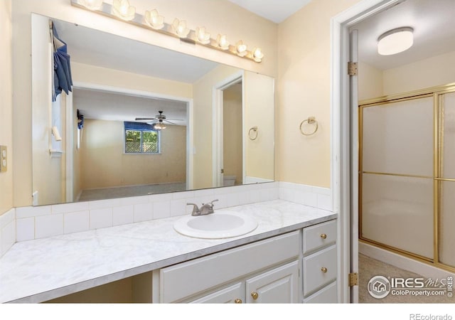 1323 Horizon Ln, Longmont, CO 80501 - full bath featuring vanity, a stall shower, and a ceiling fan