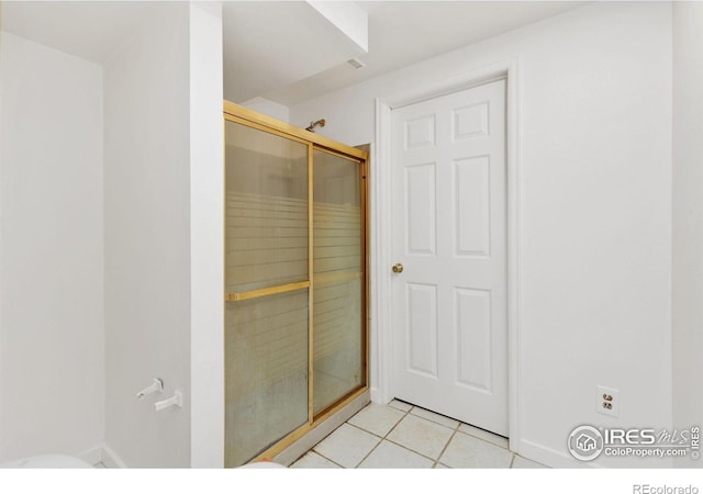 1323 Horizon Ln, Longmont, CO 80501 - bathroom featuring tile patterned flooring and a shower stall