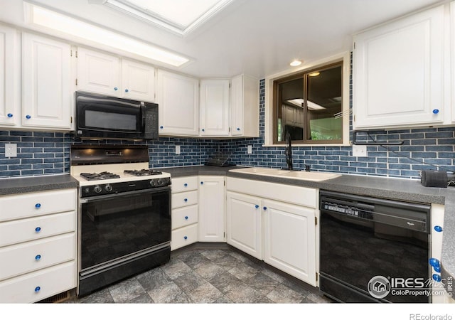 1323 Horizon Ln, Longmont, CO 80501 - kitchen with black appliances, white cabinetry, tasteful backsplash, and dark countertops