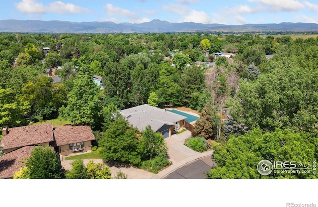 1323 Horizon Ln, Longmont, CO 80501 - drone / aerial view of a mountainous background and a heavily wooded area