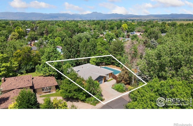 1323 Horizon Ln, Longmont, CO 80501 - aerial view of property's location featuring property parcel outlined and a forest