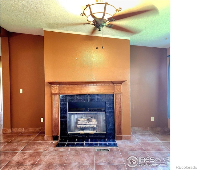 18082 County Road 25, Brush, CO 80723 - detailed view of a ceiling fan, a fireplace, and a textured ceiling