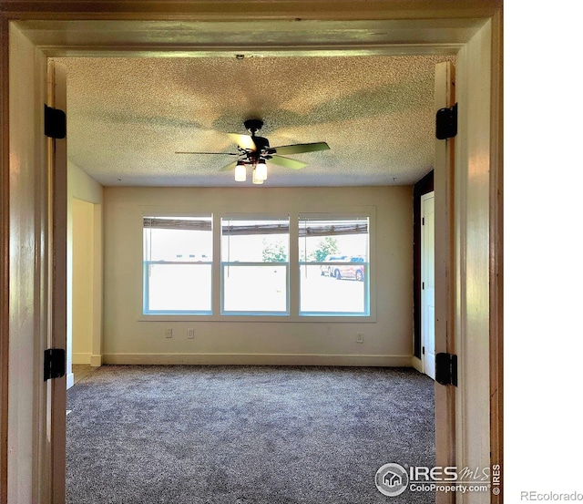18082 County Road 25, Brush, CO 80723 - carpeted empty room featuring a ceiling fan and a textured ceiling