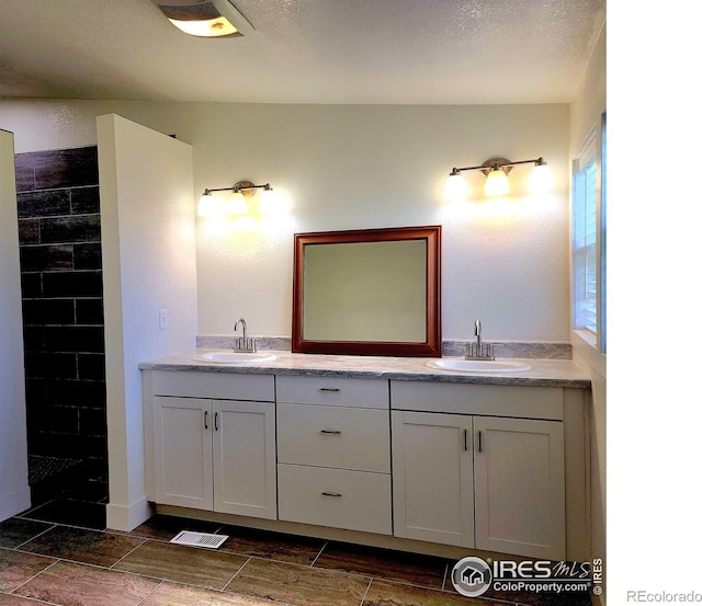 18082 County Road 25, Brush, CO 80723 - full bath featuring double vanity and tiled shower