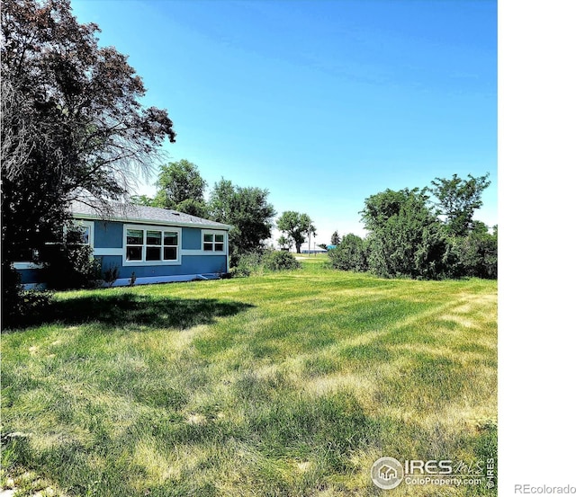18082 County Road 25, Brush, CO 80723 - view of green lawn