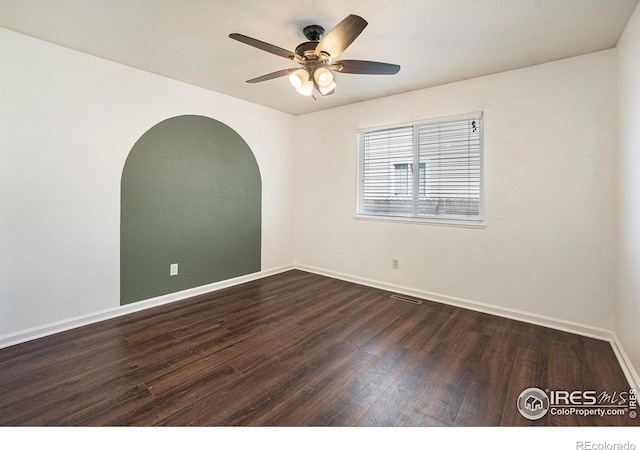 3536 38th Ave, Evans, CO 80620 - empty room with dark wood-style flooring and ceiling fan