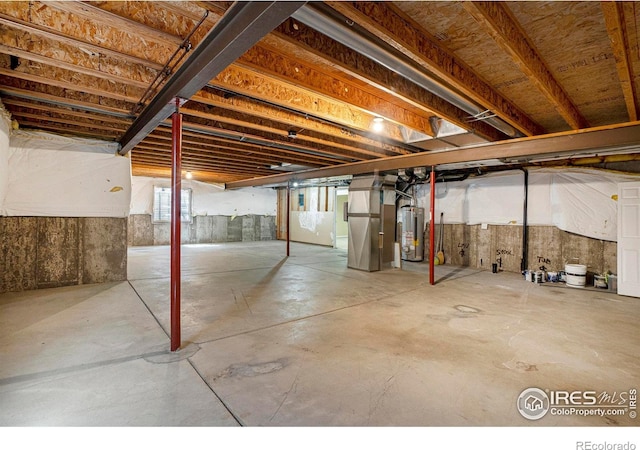 3536 38th Ave, Evans, CO 80620 - basement with water heater and heating unit