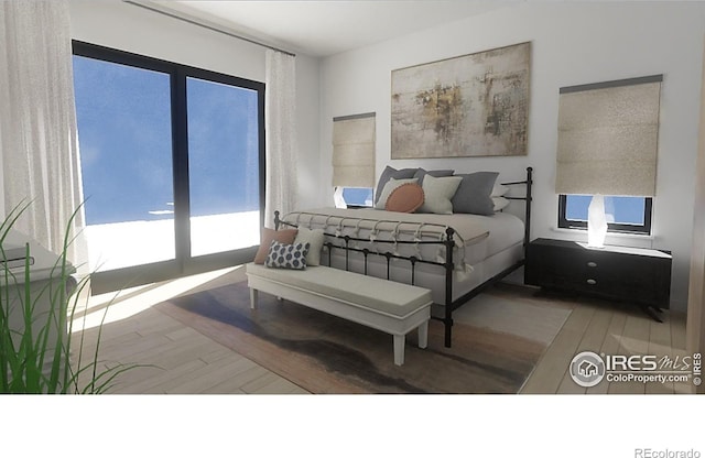 848 Trail Ridge Dr, Louisville, CO 80027 - bedroom with wood finished floors and multiple windows