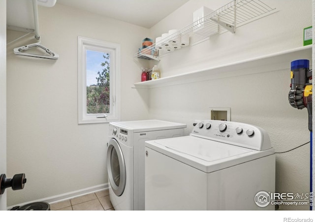345 Onyx Way, Superior, CO 80027 - laundry room featuring independent washer and dryer and light tile patterned flooring