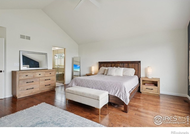 345 Onyx Way, Superior, CO 80027 - bedroom featuring wood finished floors, high vaulted ceiling, and connected bathroom