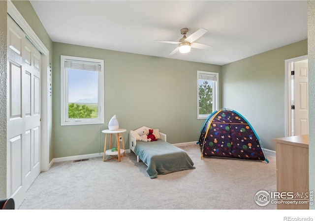 345 Onyx Way, Superior, CO 80027 - carpeted bedroom with a closet and ceiling fan