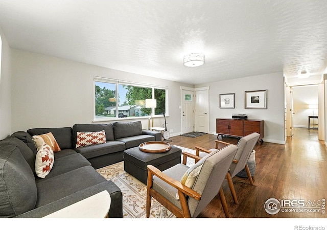 1217 Sycamore St, Fort Collins, CO 80521 - living area featuring wood finished floors and baseboards