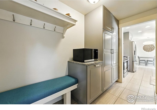 1217 Sycamore St, Fort Collins, CO 80521 - mudroom featuring light tile patterned floors
