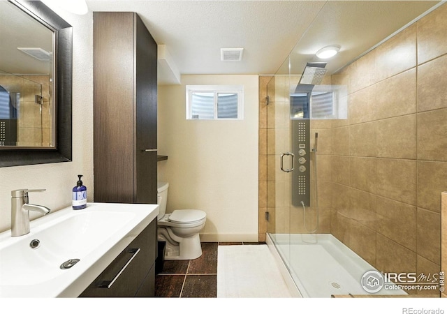 1217 Sycamore St, Fort Collins, CO 80521 - full bath featuring vanity, a stall shower, and tile patterned floors