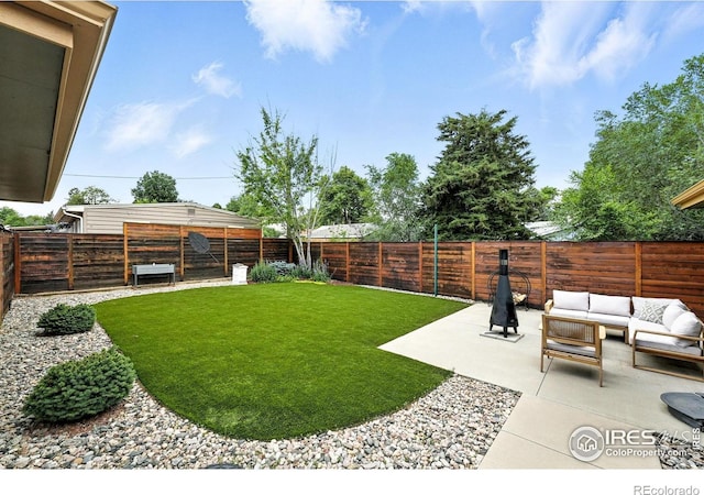 1217 Sycamore St, Fort Collins, CO 80521 - fenced backyard with a patio area and outdoor lounge area