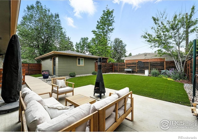 1217 Sycamore St, Fort Collins, CO 80521 - fenced backyard with an outdoor hangout area and a patio