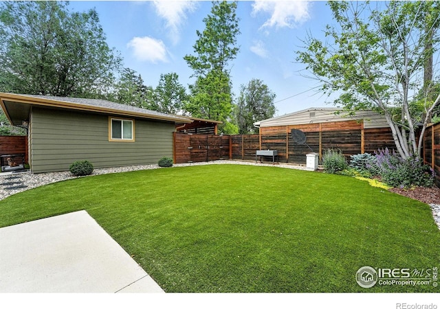 1217 Sycamore St, Fort Collins, CO 80521 - fenced backyard featuring a patio area