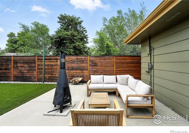 1217 Sycamore St, Fort Collins, CO 80521 - fenced backyard with outdoor lounge area and a patio
